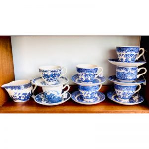 blue and white cups and saucers